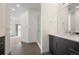 Stylish bathroom features a glass shower and sleek vanity with modern fixtures at 5810 W 39Th Pl, Wheat Ridge, CO 80212