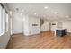 Open-concept living area with ample natural light showcases modern design and wood floors at 5810 W 39Th Pl, Wheat Ridge, CO 80212