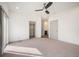 Spacious main bedroom features plush carpeting and ensuite bathroom access at 5810 W 39Th Pl, Wheat Ridge, CO 80212