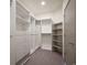 Organized walk-in closet with custom shelving and ample storage space at 5810 W 39Th Pl, Wheat Ridge, CO 80212