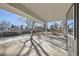 Spacious back patio, perfect for outdoor entertaining, overlooks a large backyard at 7076 S Newland St, Littleton, CO 80128