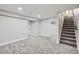 Spacious finished basement with stairs at 7076 S Newland St, Littleton, CO 80128