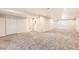 Expansive basement space features carpeting, recessed lighting, and closet creating a warm and inviting atmosphere at 2247 S Lima Ct, Aurora, CO 80014