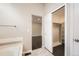 Bathroom featuring a bath and a walk in closet at 2247 S Lima Ct, Aurora, CO 80014