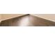 Angle shot of a pristine wood floor with painted white trim at 2247 S Lima Ct, Aurora, CO 80014