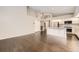 Bright, open kitchen featuring white cabinets, stainless steel appliances, and hardwood floors at 2247 S Lima Ct, Aurora, CO 80014