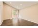 Bright room with large window and hardwood floors at 2247 S Lima Ct, Aurora, CO 80014
