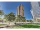 Modern building with green space and mature trees at 1020 15Th St # 17K, Denver, CO 80202