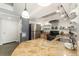 Kitchen featuring a stainless steel refrigerator and a kitchen peninsula with bar stool seating at 1020 15Th St # 17K, Denver, CO 80202