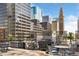 Outdoor patio with grill, dining area and views of the city's towers at 1020 15Th St # 17K, Denver, CO 80202