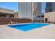 Outdoor pool with a clear blue water and a view of the buildings at 1020 15Th St # 17K, Denver, CO 80202