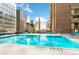 Rooftop swimming pool with views of the city at 1020 15Th St # 17K, Denver, CO 80202