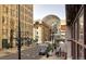 Street view of a city building with an arched glass roof that offers a scenic view at 1020 15Th St # 17K, Denver, CO 80202