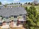 The outdoor space includes a covered patio and upper deck, perfect for enjoying the landscape at 6701 W Yale Ave, Lakewood, CO 80227