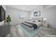 Well-lit main bedroom featuring modern furnishings and a calming color palette at 7814 S Grand Baker Ct, Aurora, CO 80016