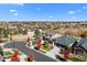 Beautiful aerial shot of the community with landscaping, neighborhood with manicured trees and fall colors at 7814 S Grand Baker Ct, Aurora, CO 80016