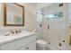 Bathroom featuring a glass shower, tiled floor, and vanity at 10 Oakmont Ln, Littleton, CO 80127