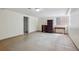 Open basement with tiled floors, a small window, and plenty of storage space at 1497 S Garfield St, Denver, CO 80210