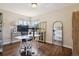 Office space featuring dark wood floors, natural light, and dual monitors at 1497 S Garfield St, Denver, CO 80210