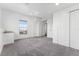 Spacious bedroom with neutral walls, carpet flooring, and a window with city views at 2388 S Loveland Way, Lakewood, CO 80228