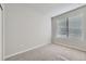 Bright bedroom with neutral walls and plush carpeting at 2370 W 167Th Ln, Broomfield, CO 80023