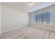 Bright bedroom featuring neutral walls and plush carpeting at 2370 W 167Th Ln, Broomfield, CO 80023