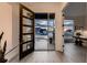 Welcoming entrance hall showcasing an open door and contemporary design at 8868 Geyser Peak Way, Parker, CO 80138