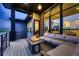 Inviting outdoor deck with comfortable seating and a cozy fire pit at 8868 Geyser Peak Way, Parker, CO 80138