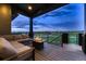 Outdoor deck with stunning views, comfortable seating, and modern fire pit at 8868 Geyser Peak Way, Parker, CO 80138
