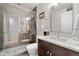 Well-lit bathroom with a glass-enclosed shower and modern vanity at 1690 Bassett St # 6, Denver, CO 80202