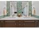 Stylish bathroom featuring a double vanity, modern fixtures, and decorative tile backsplash at 1690 Bassett St # 6, Denver, CO 80202