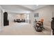 Spacious basement area with comfortable seating, desk, and ample room for customization at 16268 Mount Silverheels Way, Broomfield, CO 80023