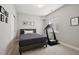 Cozy bedroom with a comfortable bed, neutral decor, and natural light from the window at 16268 Mount Silverheels Way, Broomfield, CO 80023