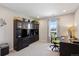 Comfortable office space with built-in shelving, ample storage, and a bright window view at 16268 Mount Silverheels Way, Broomfield, CO 80023