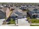 Inviting single-Gathering home with a well-manicured lawn and an attached three-car garage at 24447 E Ada Ave, Aurora, CO 80018