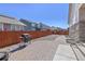 Outdoor kitchen space with a grill, pavers, and a fenced yard at 24447 E Ada Ave, Aurora, CO 80018