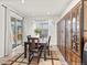Dining area with sliding door access to the patio and decorative hutch at 24447 E Ada Ave, Aurora, CO 80018