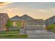Charming single-Gathering home with a well-manicured lawn and an attached three-car garage at 24447 E Ada Ave, Aurora, CO 80018