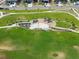 Aerial view of the neighborhood park with walking trails and playground at 24447 E Ada Ave, Aurora, CO 80018