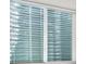 Window with white blinds at 24447 E Ada Ave, Aurora, CO 80018