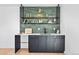 Stylish bar area with modern shelving, countertop, and ample storage at 16132 W 14Th Ave, Golden, CO 80401