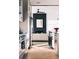 Bright open floorplan features a modern kitchen and cozy living area with fireplace at 16132 W 14Th Ave, Golden, CO 80401