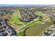 Aerial view of the neighborhood with golf course and ponds at 4405 Fairway Ln, Broomfield, CO 80023