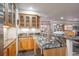 Finished bar area complete with a wine fridge and cabinets with countertop space at 4405 Fairway Ln, Broomfield, CO 80023
