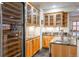 Finished bar area complete with a wine fridge and cabinets with countertop space at 4405 Fairway Ln, Broomfield, CO 80023