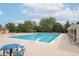 Enjoy community pool with covered lounge area, seating, and well-maintained surroundings at 4405 Fairway Ln, Broomfield, CO 80023