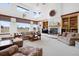 Cozy living room featuring a fireplace and carpet at 4405 Fairway Ln, Broomfield, CO 80023
