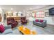 Open-concept living room with a pool table, bar area, and comfortable seating at 4405 Fairway Ln, Broomfield, CO 80023