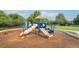 Community playground with slides, climbing structures, and soft landing at 4405 Fairway Ln, Broomfield, CO 80023
