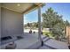 Inviting front porch with views of the street at 4996 Cathay Ct, Denver, CO 80249